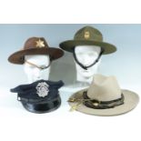 Four US police hats