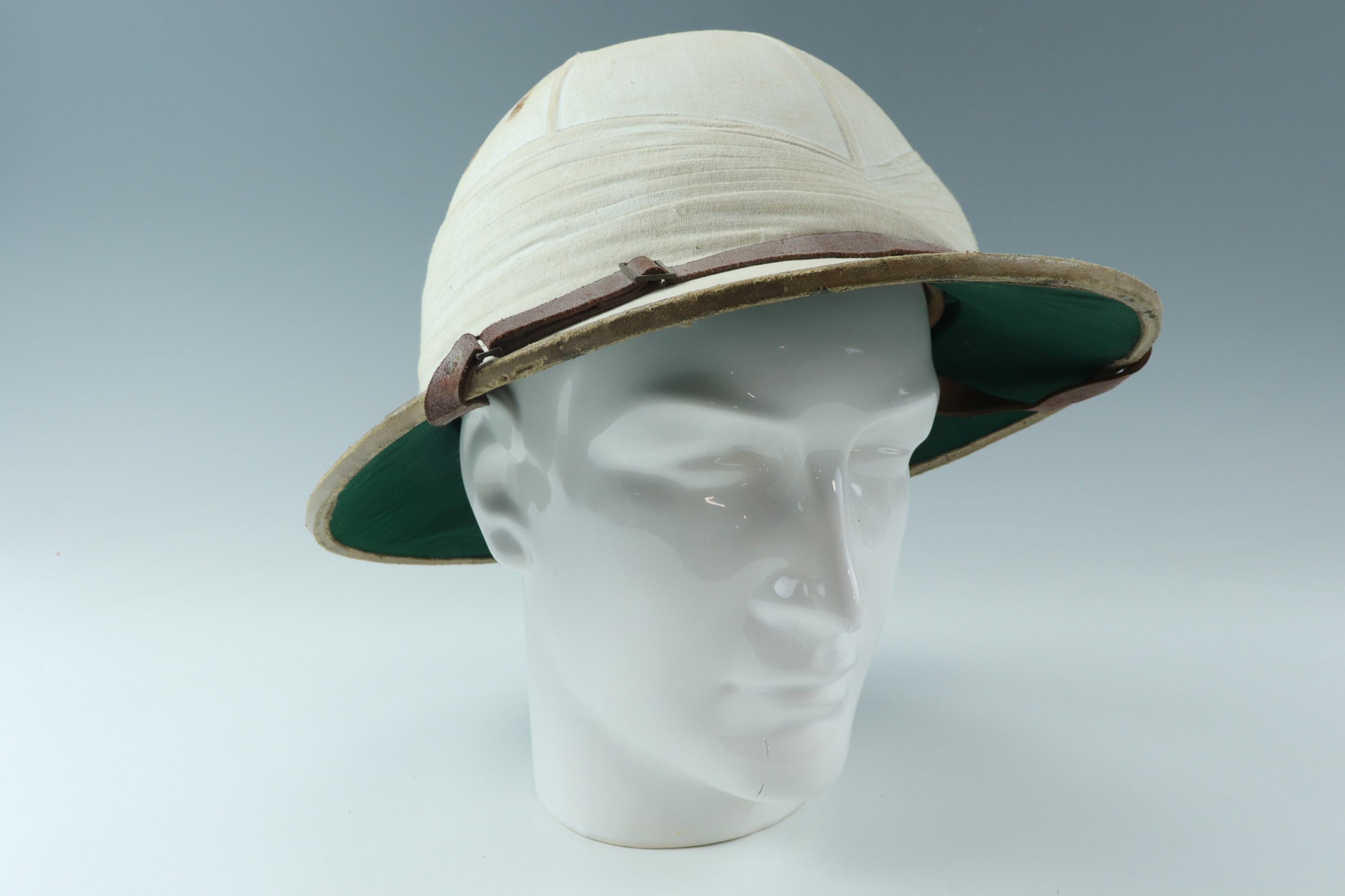 An Ellwood tropical cork helmet by "The Simon Arzi Stores", Post Said