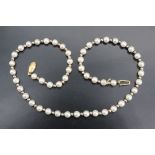 A cultured pearl necklace, having a nine carat gold box clasp, Birmingham, 1996, the pearls being