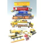 A large quantity of die-cast model wagons, a crane, JCBs etc (2 trays)