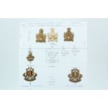 A group of Royal Army Education Corps and Intelligence Corps cap badges