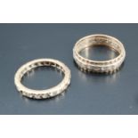 Two yellow metal and white stone eternity rings, 5.6 g