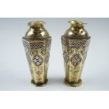 A pair of early 20th Century Cairo ware vases, (14 cm)