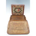 A Victorian mahogany-framed gros pointe needlework teapot stand, together with two early 20th