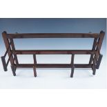 A Victorian wall mounting folding coat rack, 68 x 30 cm