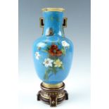 An Aesthetic enamelled porcelain vase in the manner of Christopher Dresser for Minton, un-marked, (