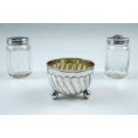 A Victorian small gadrooned silver salt cellar together with Sterling white metal capped salt and