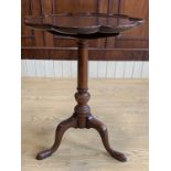 A reproduction Georgian mahogany wine table, having a cusped circular tray top, and cabriole legs