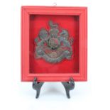 A pre-1953 Grenadier Guards RSM's dress rank badge, framed, a label verso identifying its original