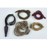A sword knot and four lanyards