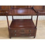 A reproduction Georgian mahogany side table, having a tray top and a pair of base drawers, 56 cm x