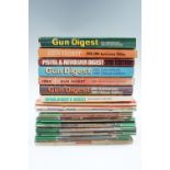 Six volumes of Gun Digest, 1960s to 1980s, together with a quantity of "gun and Accessory"