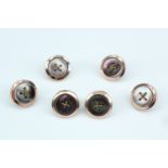A set of six vintage rolled gold and faux tortoiseshell dress studs in the form of stitched buttons,
