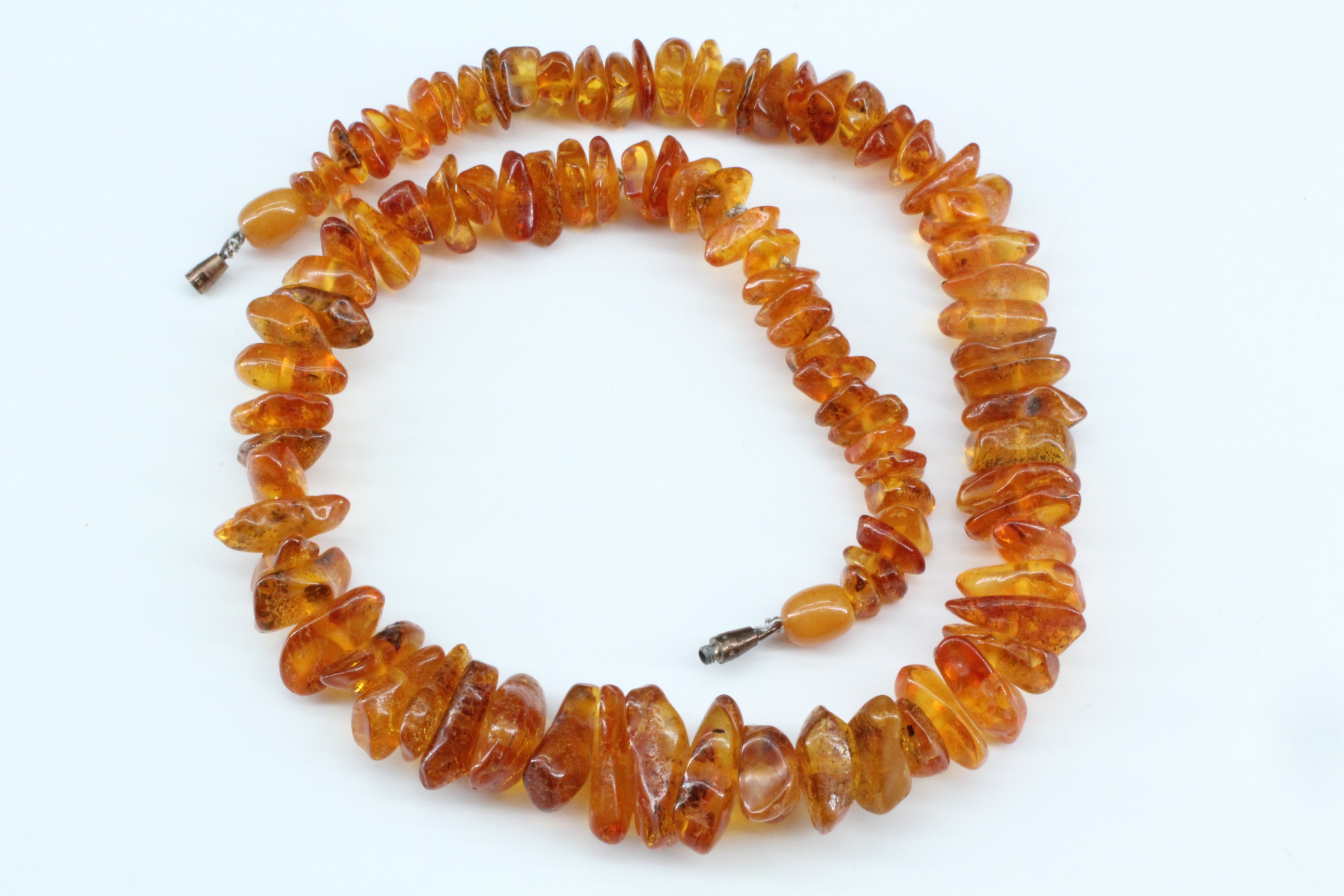 A necklace of irregular amber beads, 45 mm