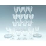 Three sets of six crystal glasses including sherries