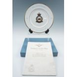 An RAF 14 Maintenance Unit, Carlisle 50th Anniversary commemorative plate by Wedgwood, together with