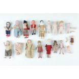 A large number of Victorian small articulated porcelain and similar dolls