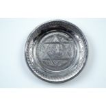 An Egyptian engraved white metal pin dish, tested as silver, struck marks, circa 1942-3, 7.5 cm