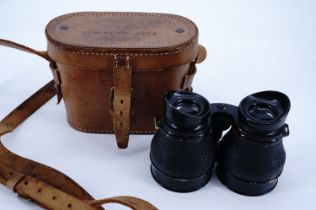 A cased set of Second World War British military 2 1/2 x 50 10-degree field binoculars, [Of a