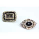 Two Victorian mourning brooches, largest 21 mm x 16 mm