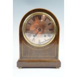 An early 20th Century string inlaid mahogany mantle clock, face 15 cm