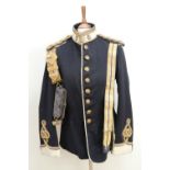 An early 20th Century Army Service Corps officer's dress frock and sword belt