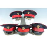 Five post-War Grenadier Guards dress peaked caps