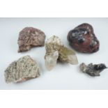 A collection of uncommonly large mineral specimens including galena, haematite / kidney ore and