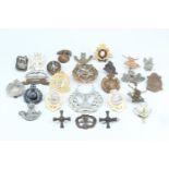 A quantity of cap badges