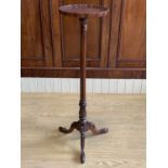 A reproduction Georgian mahogany torchere, 104 cm