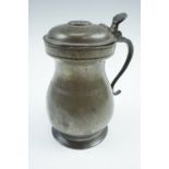 A Victorian Glasgow Imperial Standard lidded pewter tankard, 15.5 cm