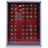 A framed display of George V - VI Grenadier Guards buttons