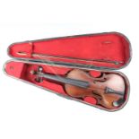 A late 19th / early 20th Century violin, having a two-piece back, in wooden case with bow, (violin