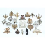 A quantity of cap badges