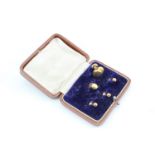 A vintage 9 ct gold shirt stud, 1 g, together with four other rolled gold studs and a case