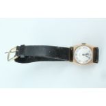 A 1950s Record 9 ct gold wristwatch, having their calibre 107 15 jewel movement and brushed silver