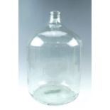 A large clear glass carboy, 32 cm x 47 cm