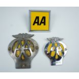 Three AA car bumper badges