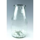 A clear glass jar and pebbles, 35 cm