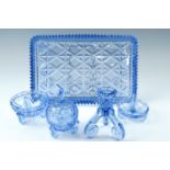 A five piece blue glass dressing table set ( tray a/f )
