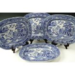 A set of four Victorian blue-and-white transfer-printed earthenware willow pattern ashets, 39 cm