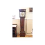 An early 18th Century style mahogany long case clock having an 8 day movement with brass face