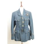 A Second World War RAF air gunner officer's tunic, its label inscribed with the name P/O Warner