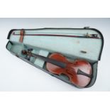 A vintage student's violin, cased with bow, 33 cm back excluding nose, (a/f)