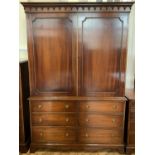 A reproduction Georgian mahogany wardrobe-on-chest, 127 cm x 61 cm 188 cm