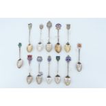 12 silver and enamelled silver souvenir teaspoons, relating to Ireland including Dublin, Ulster etc,
