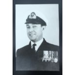 A signed portrait photograph of Royal Navy Lieutenant Thomas William Gould, one of three Jewish