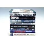 A group of books on military sniping