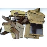 Sundry British military accoutrements including Sam Browne belts, Second World War respirator