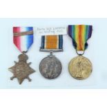 A 1914 Star with clasp, British War and Victory Medals to 8404 Sjt W M Lammin, Northumberland